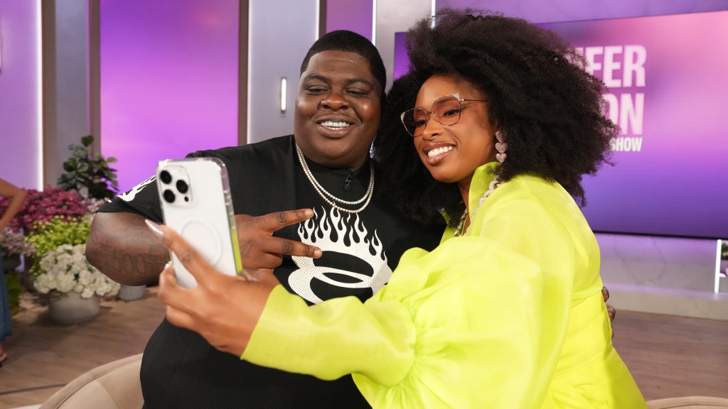 Two people taking a photo