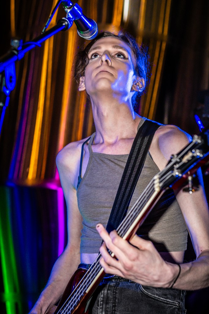 Band member performing on stage