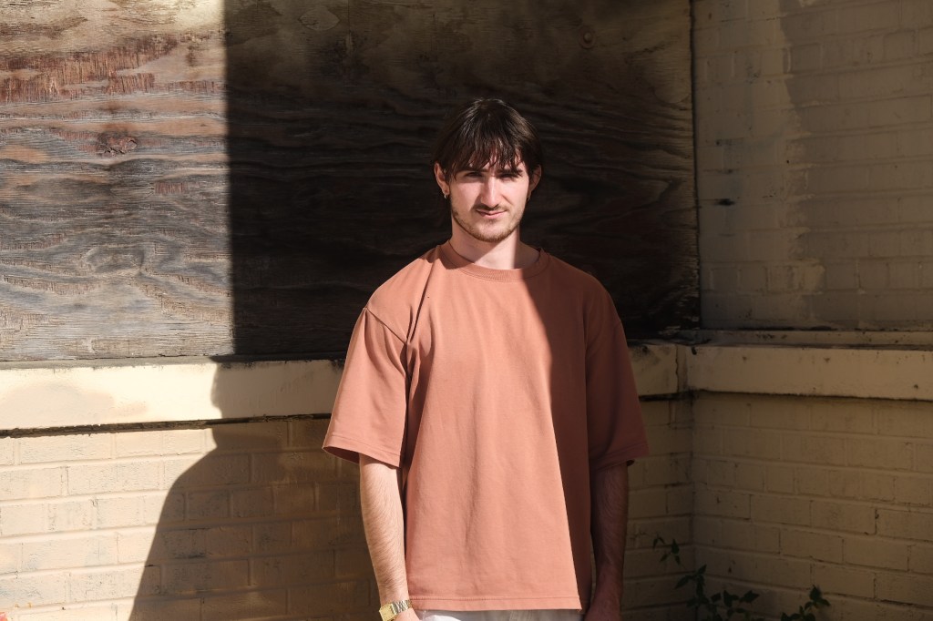 Man standing in front of background