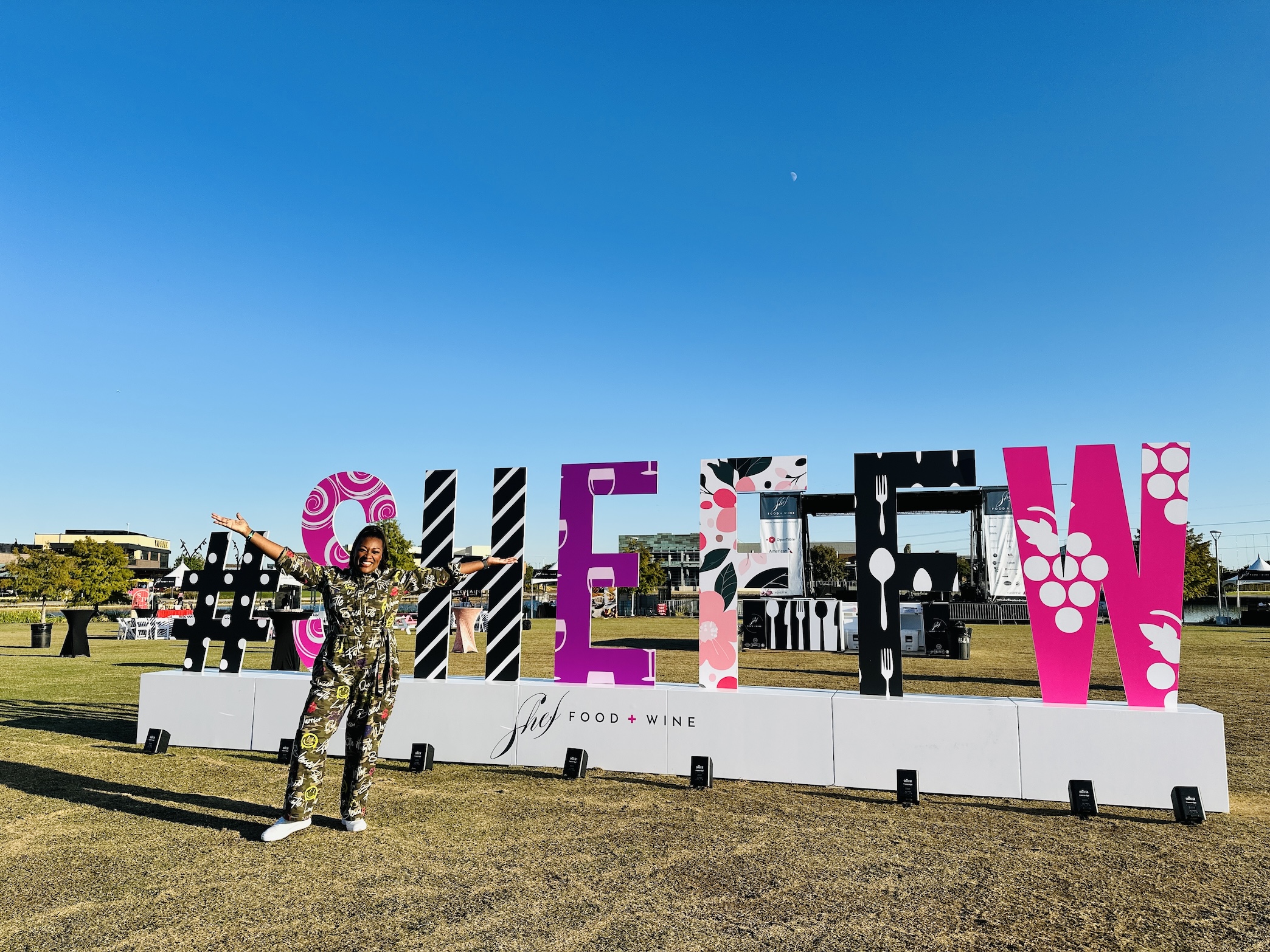 Chef Tiffany Derry in front of ShefFW sign