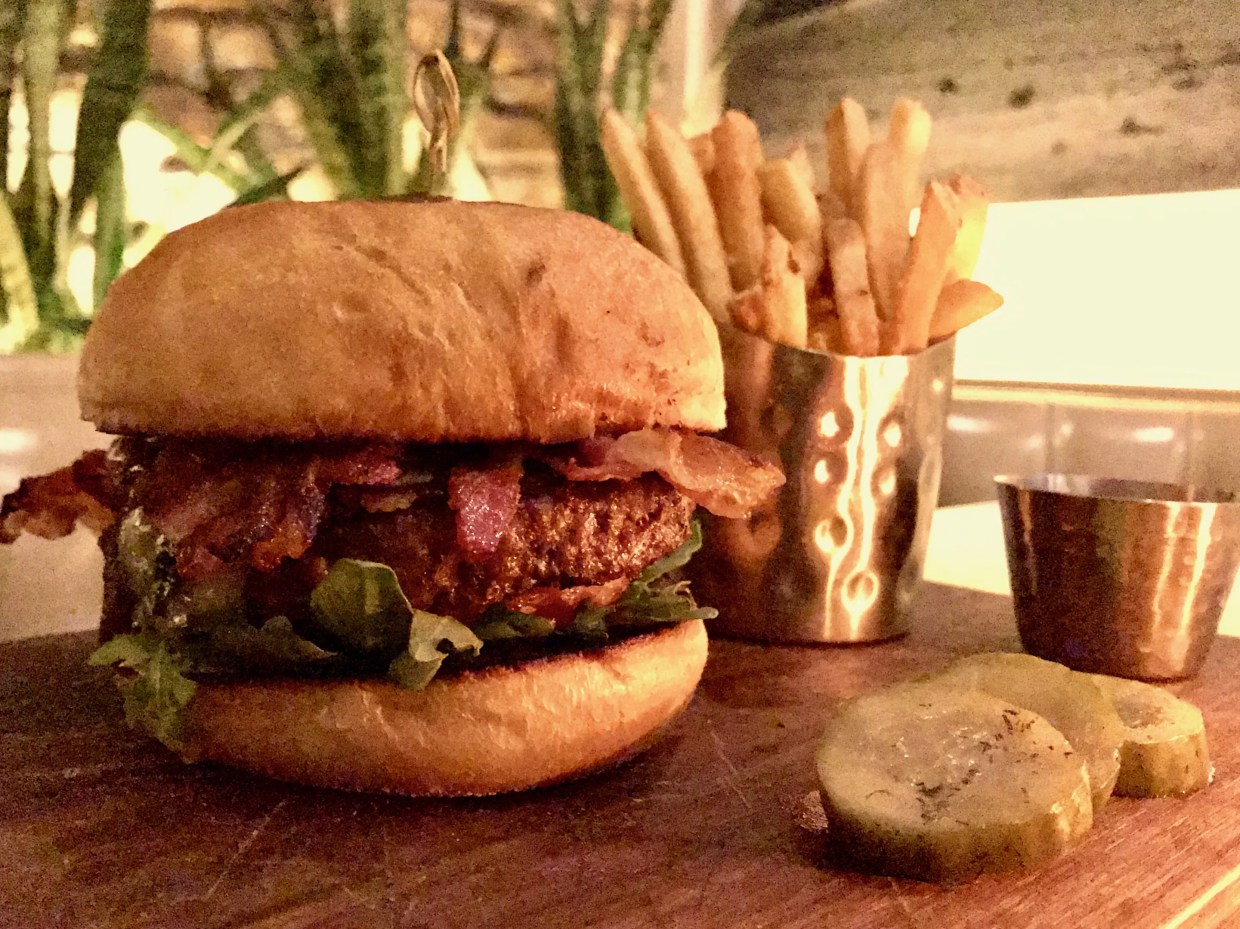 One of the Great New Dallas Burgers Is Hiding in a Desert-Chic Cocktail Den