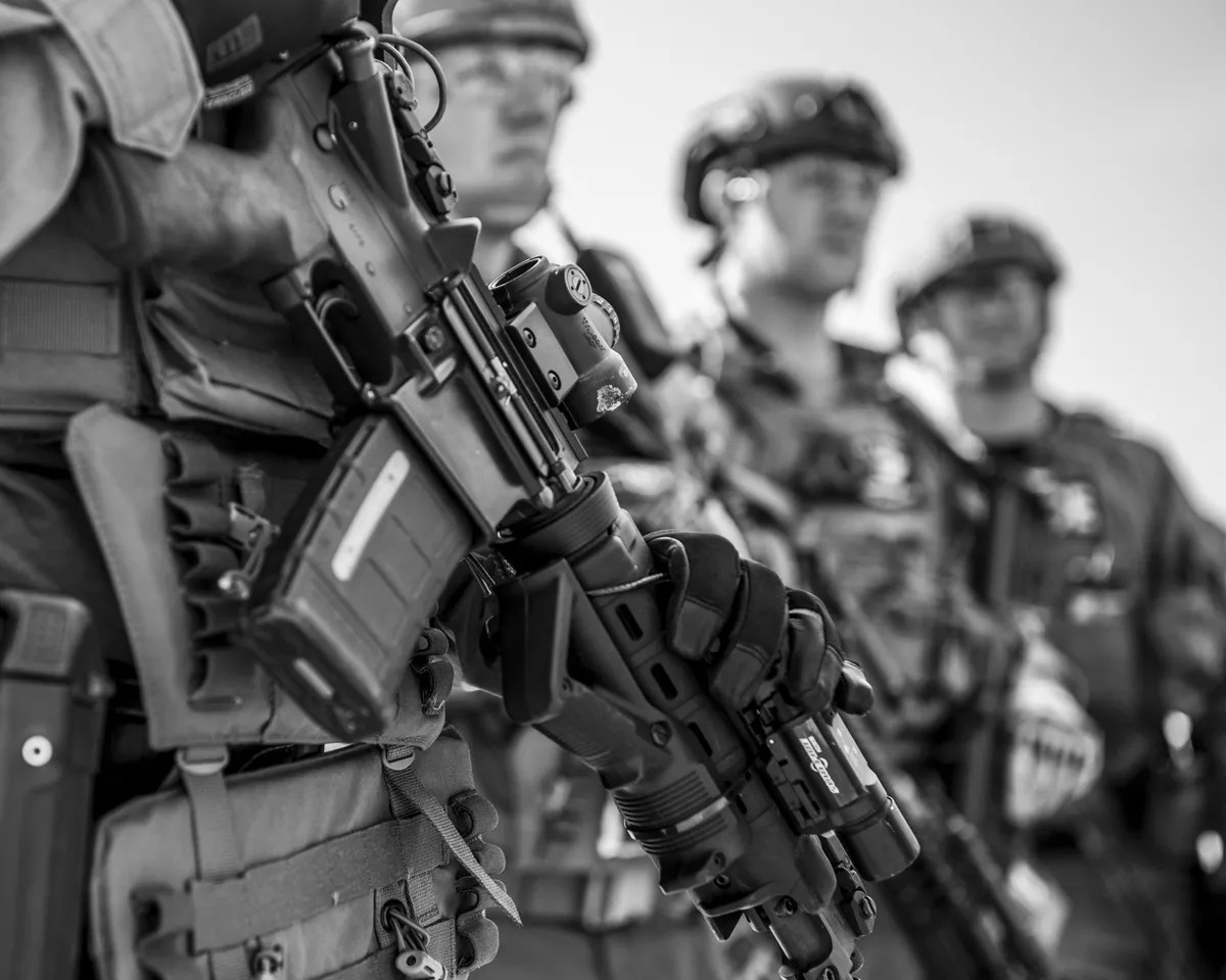 Big Guns for Small Towns: Suburban Officers Team Up to Give Their Cities SWAT Firepower