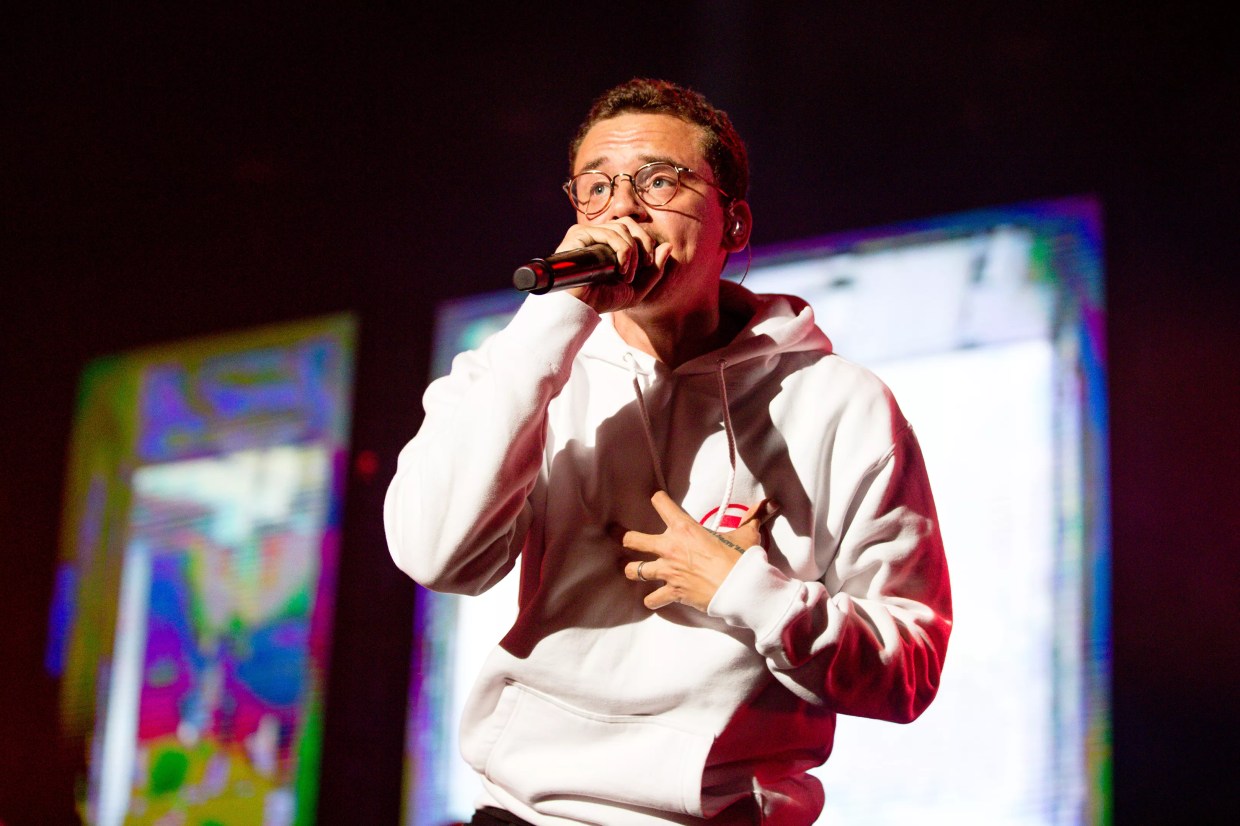 Fan Brought Onstage at Logic Show Blows Arena Away with Rapping Skills