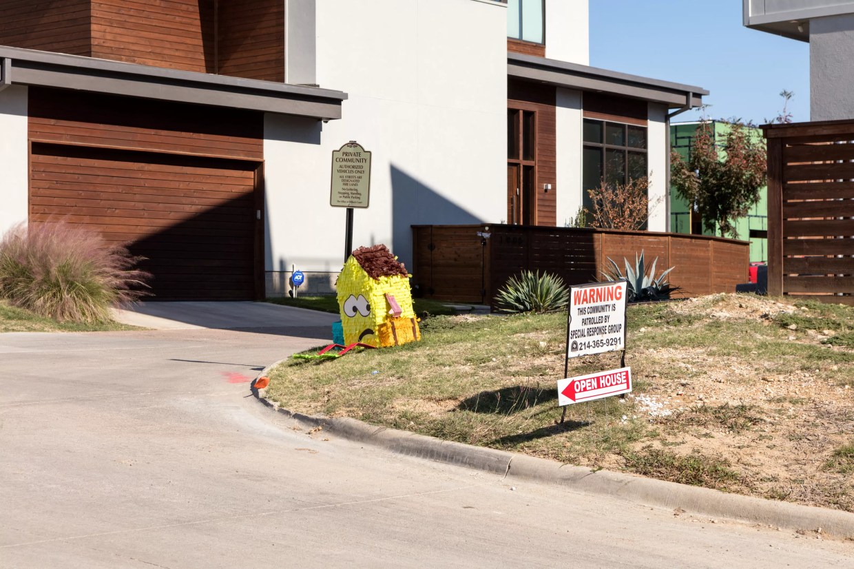 These Sad-Faced House Piñatas Perfectly Encapsulate Dallas’ Affordable Housing Problem