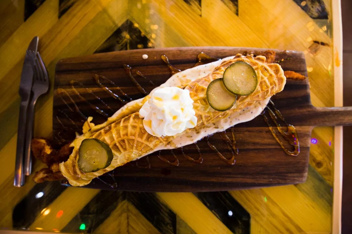 Zoli’s Foot-Long Nashville Hot Chicken and Waffle Cannoli Flips Brunch on Its Head