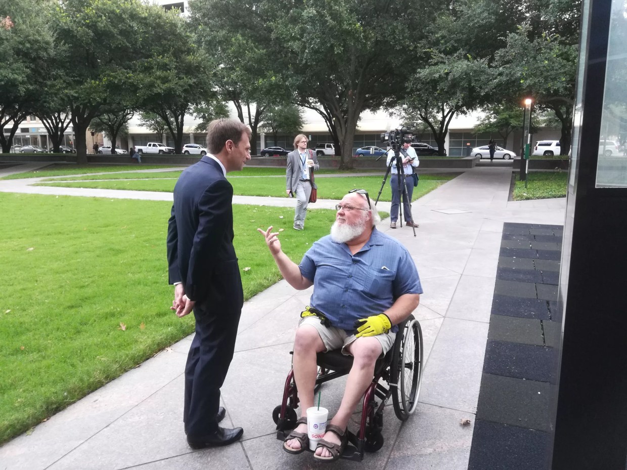 Protesters Call Out Paxton as Texas Attorneys Argue to End Obamacare