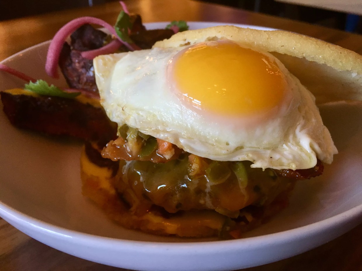 The Perfect $7 Happy Hour Burger Lives in an Arepa at Shoals