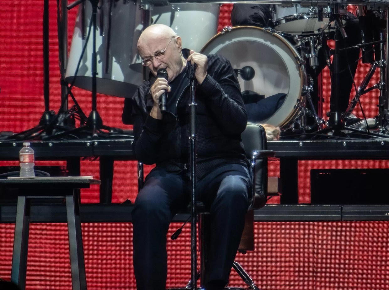 Phil Collins Performed in Dallas Post-Surgery While Seated, but He Still Cemented His Legacy