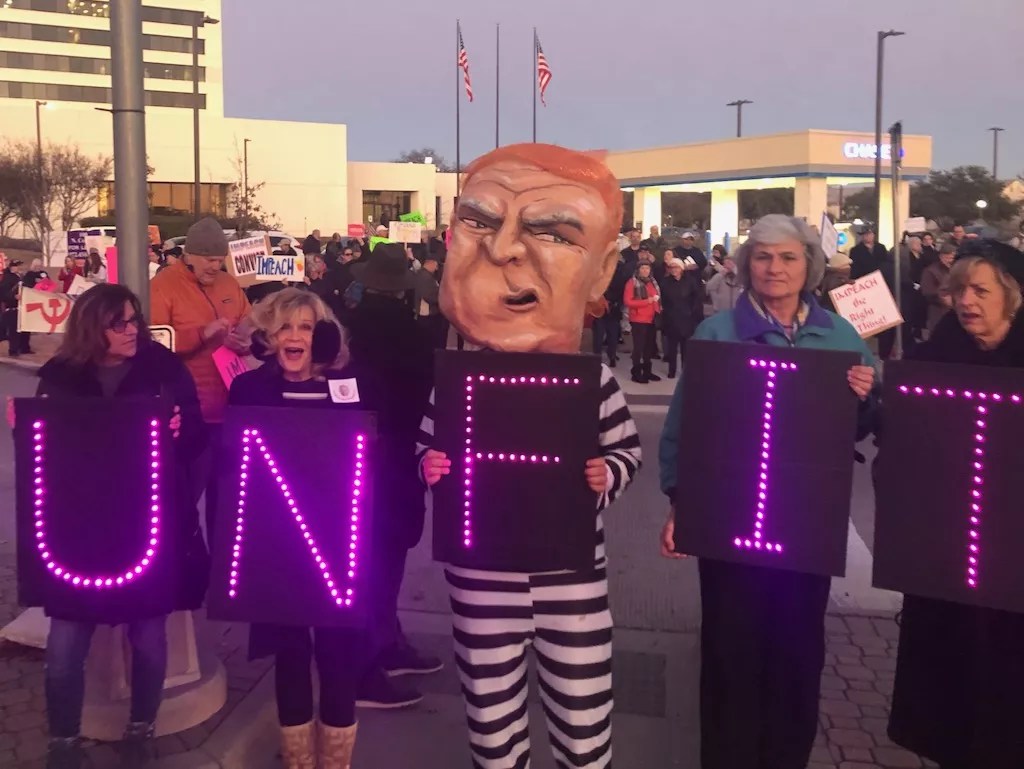 Hundreds Rally in Solidarity Outside Allred’s Offices Ahead of House Impeachment Vote