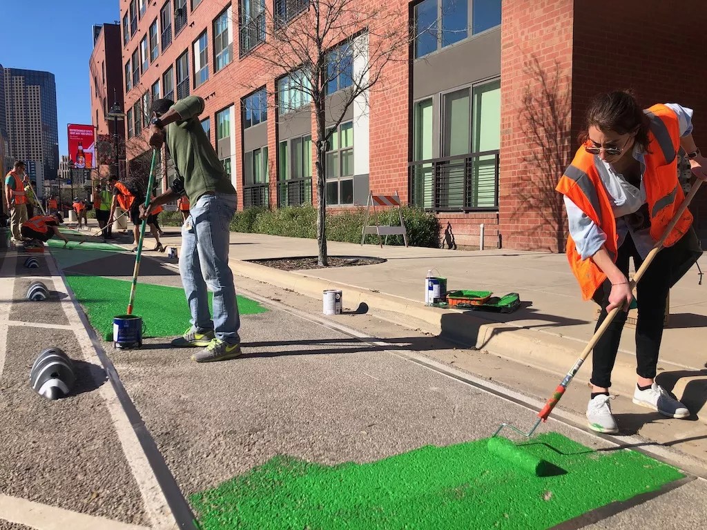 Volunteers Add Some Pizzazz to Pioneering Downtown Bike Lane