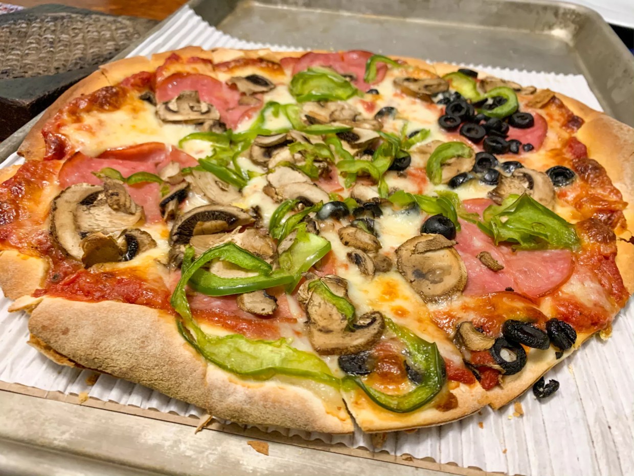 Good to Go: Louie’s Pizzas Travel Well Enough To Remain Some of the Best