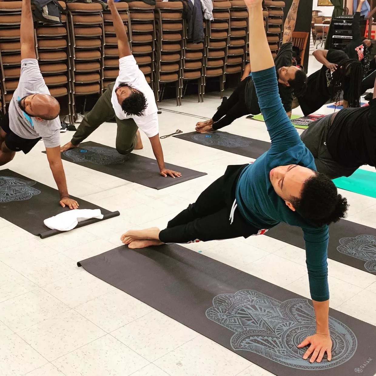 Sherri Doucette Is Healing Black Men One ‘Broga’ Pose at a Time