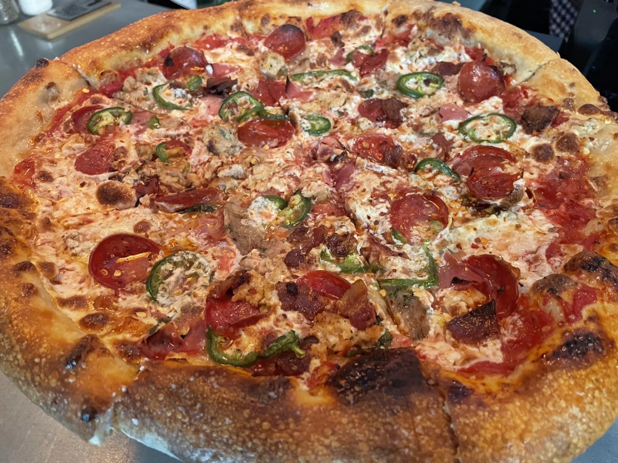 First Look: PT Neighborhood Pizzeria Near Love Field, Pizza Gods Conspire