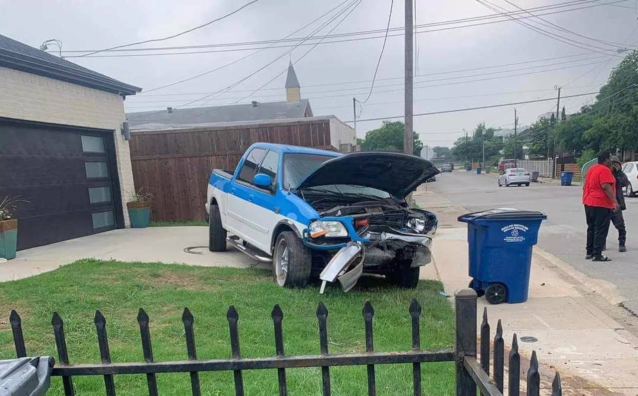 crashed truck in front yard