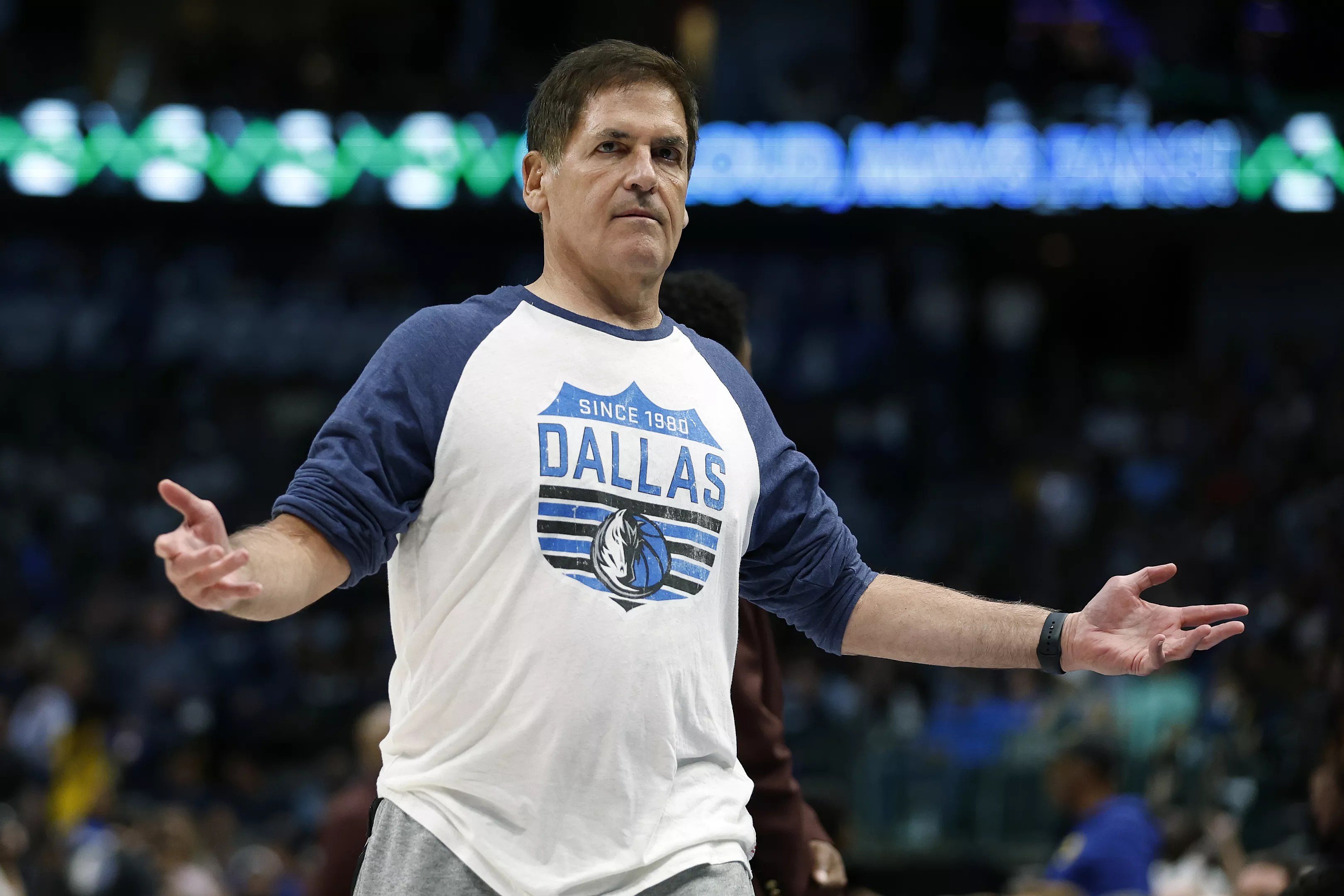 The NBA Board of Governors approved Mark Cuban's sale of the Dallas Mavericks to two families who head the Las Vegas Sands Corporation.
