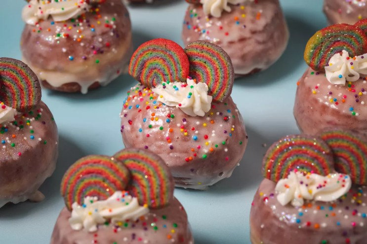 Doughnuts with Pride month frosting.
