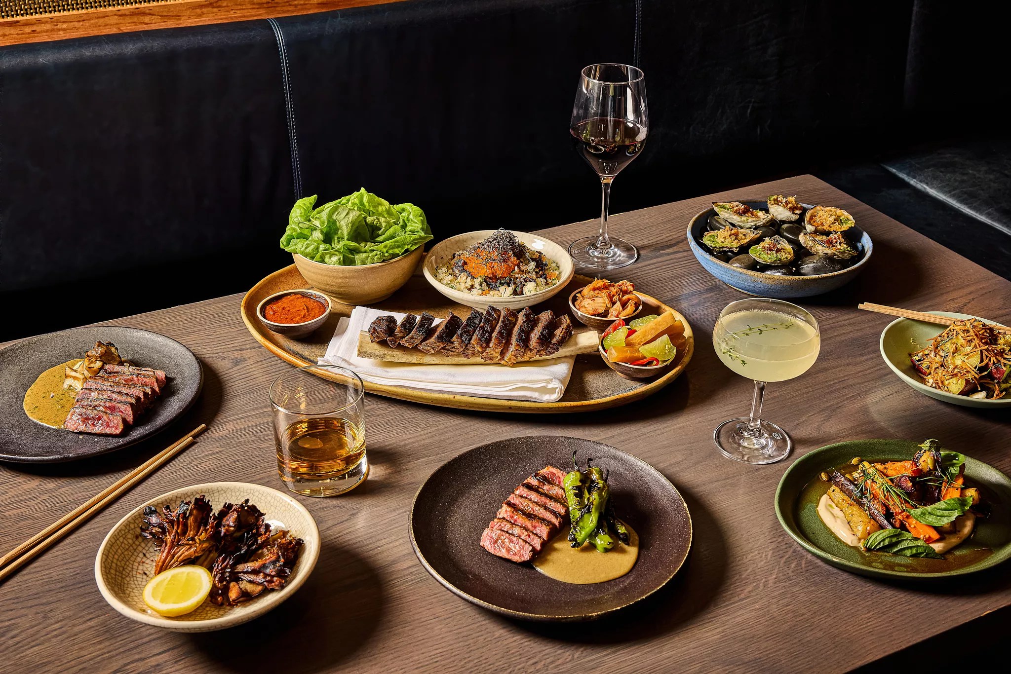 A spread of dishes from Uchiko, now open in Plano.