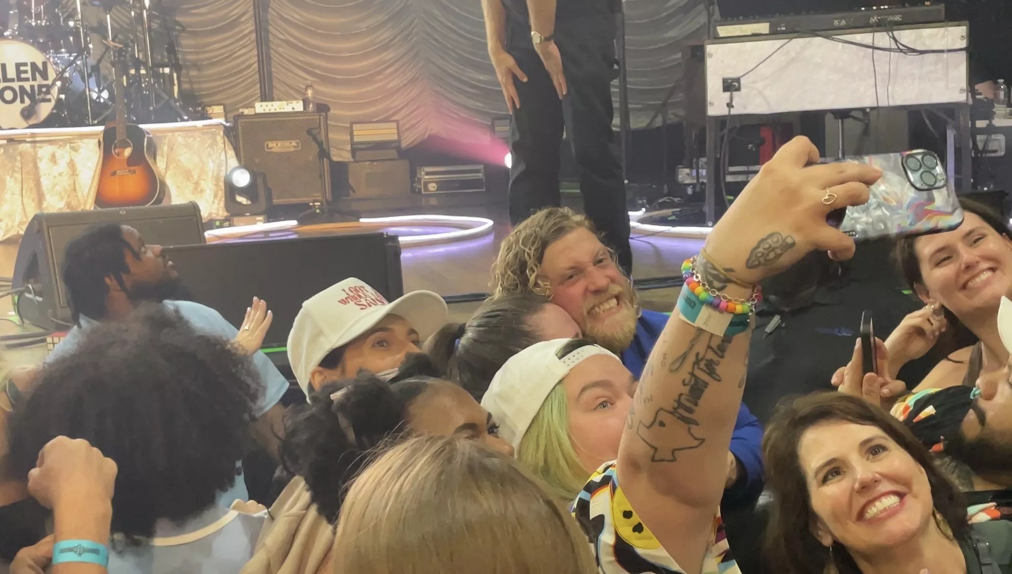 Singer Allen Stone takes selfies with fans after a Dallas concert at House of Blues.