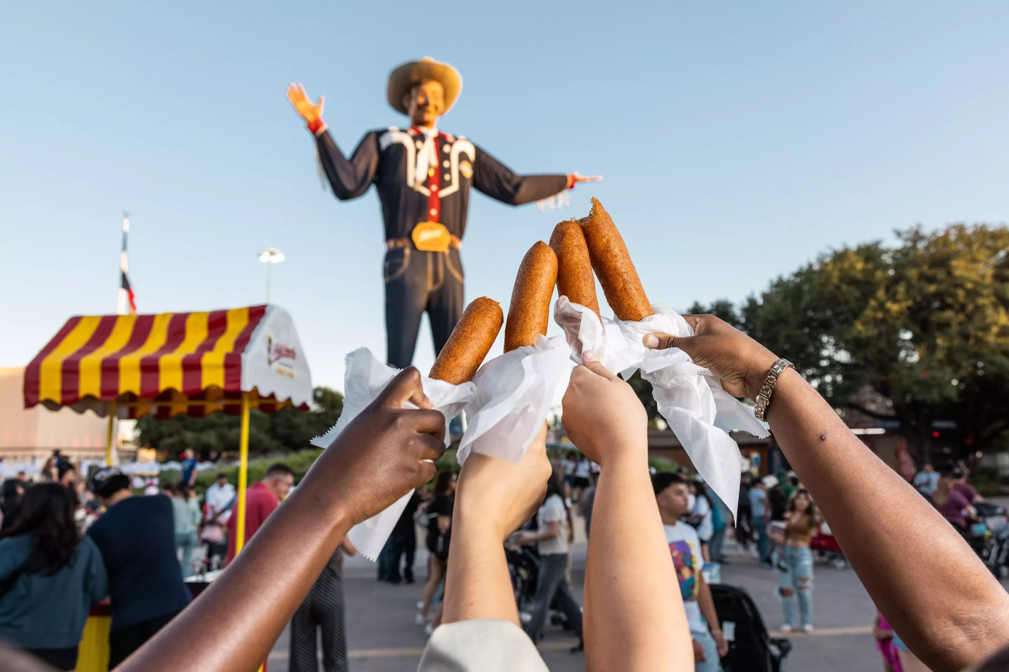 big tex at the state fair of texas with corn dogs