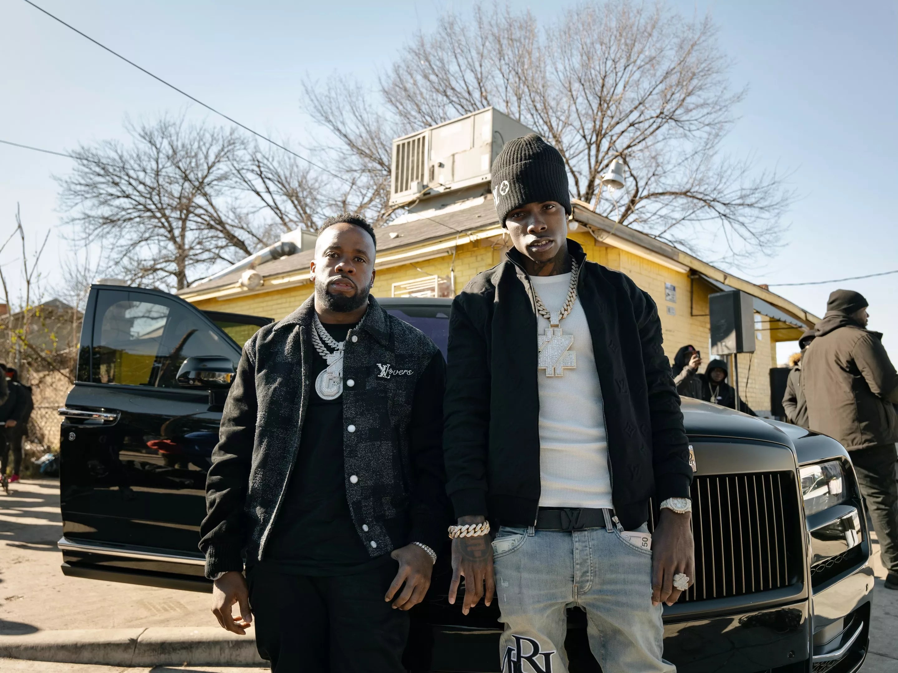 Yo Gotti (left) and his newly signed Protégé, Dallas rapper Zillionaire Doe (right).