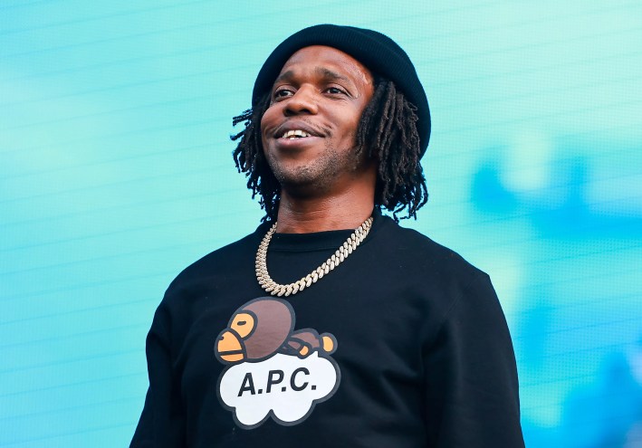 Curren$y performs on stage during 2022 Rolling Loud New York at Citi Field on September 25, 2022 in New York City.