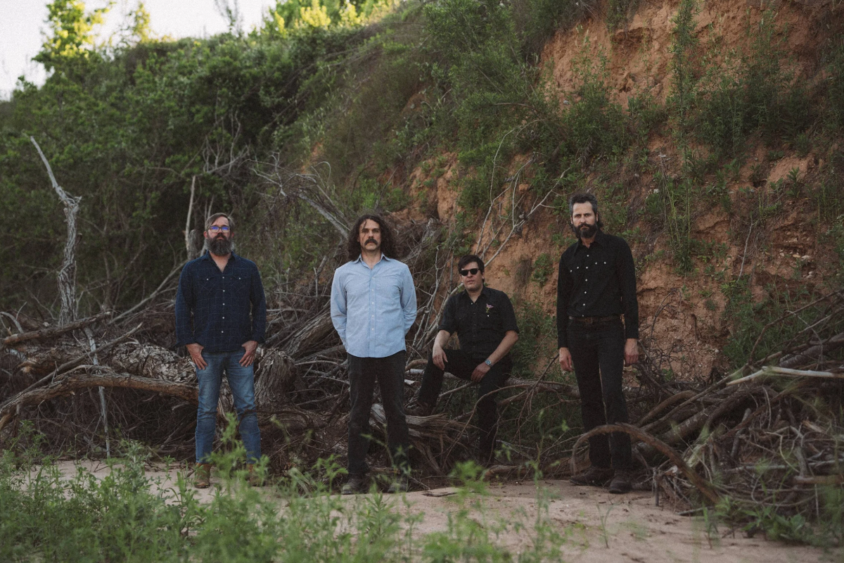 Band posing in nature