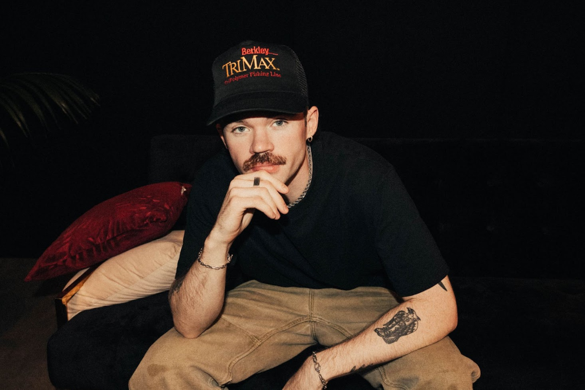 Man sitting down posing