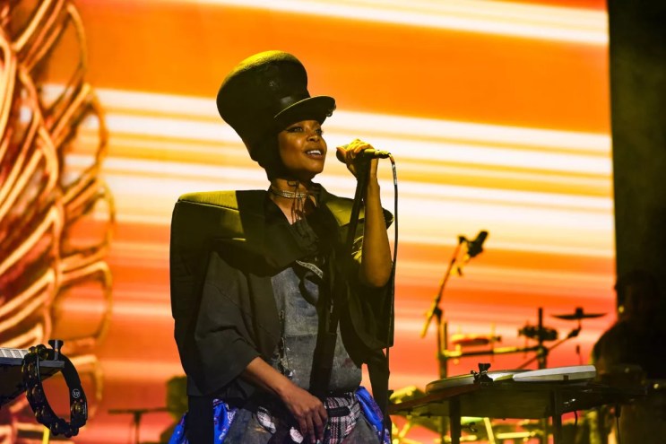 Woman singing on stage