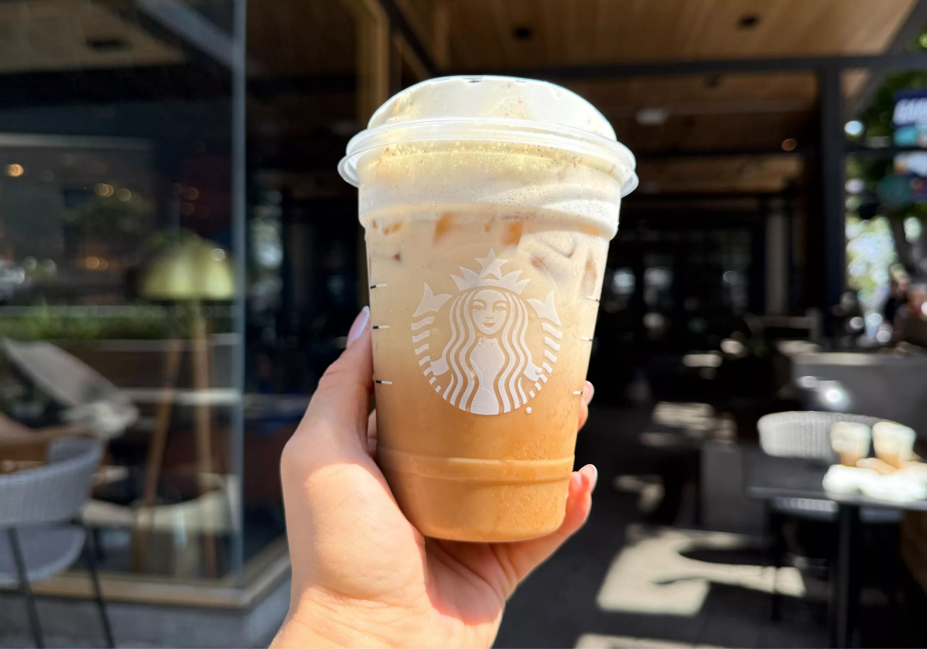 A brown sugar oatmilk shaken espresso with white chocolate mocha sauce and vanilla sweet cream cold foam