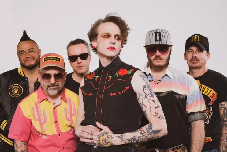 Band is posing for a picture