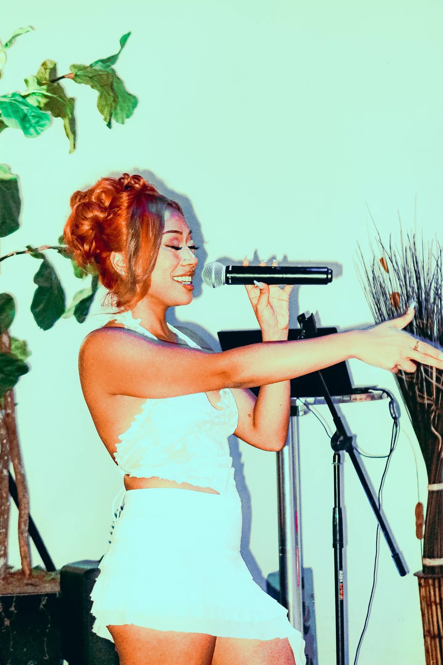 Woman singing on stage