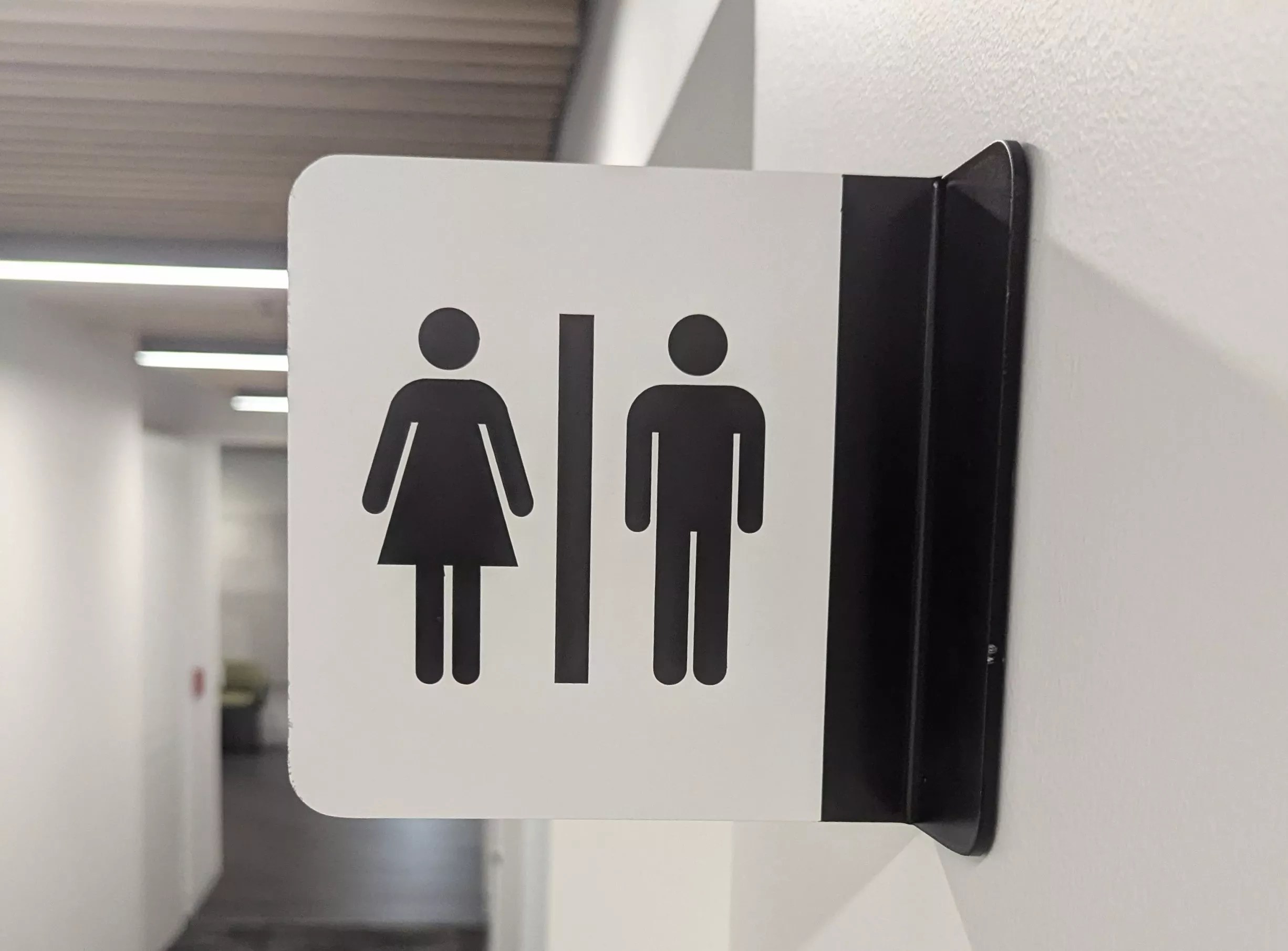 airport bathroom sign